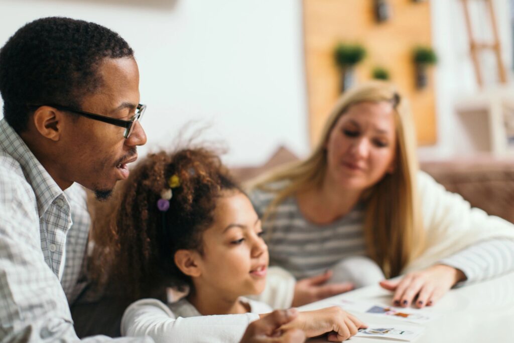 happy diverse family learning together